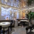 深圳福田天健時尚新天地輕奢風格火鍋店裝修案例卡座用餐區(qū)效果圖
