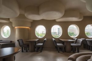 深圳南山洞穴造型餐廳褐色用餐區(qū)裝修設(shè)計