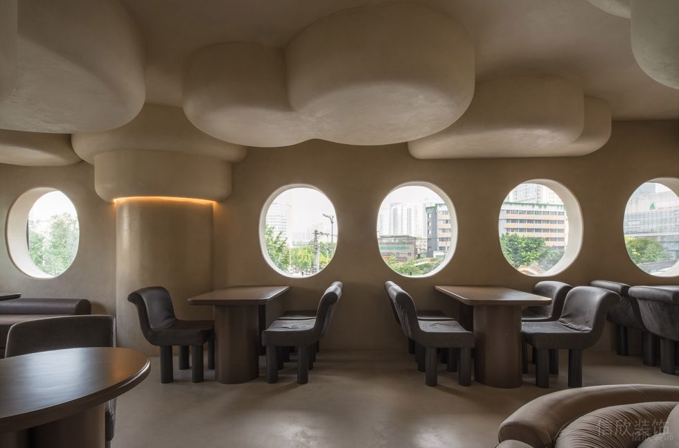 深圳南山洞穴造型餐廳褐色用餐區(qū)裝修設(shè)計